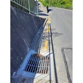 A picture containing text, outdoor, concrete, cement

Description automatically generated