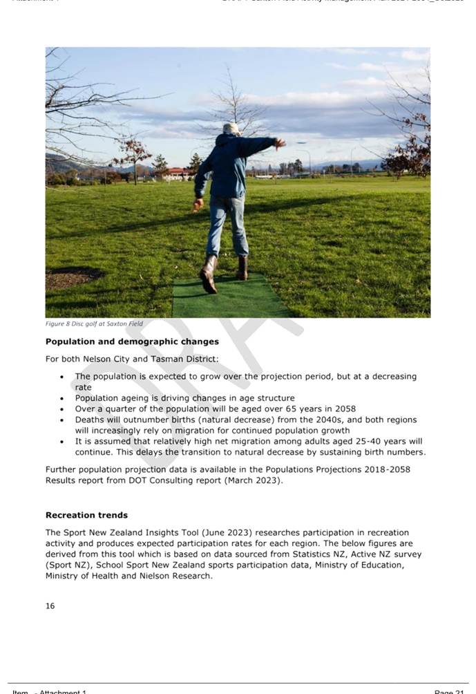A person jumping on a green mat

Description automatically generated