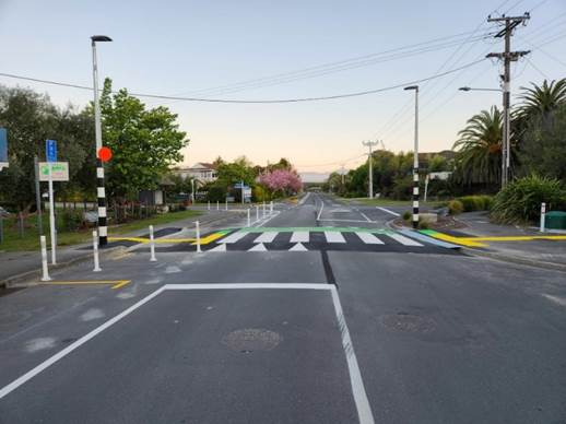 A crosswalk in a street

Description automatically generated