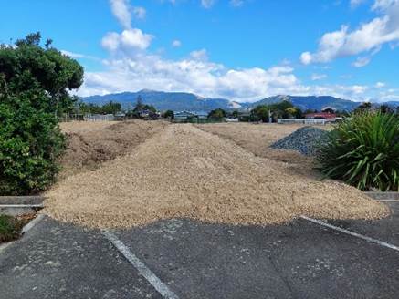 A road with dirt and gravel

Description automatically generated with medium confidence