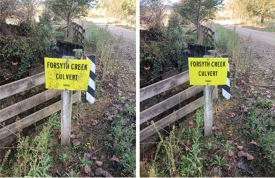 A yellow sign on a wooden post

Description automatically generated
