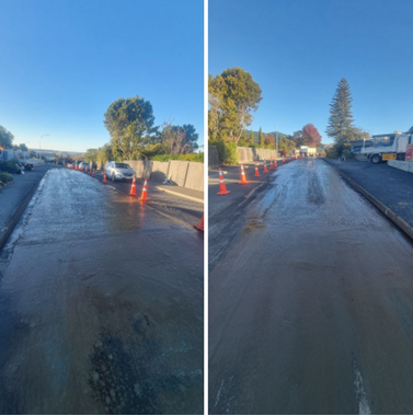 A road with a few cones

Description automatically generated with medium confidence