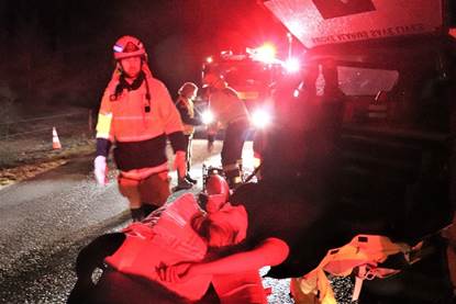 Emergency personnel and emergency vehicles

Description automatically generated with medium confidence