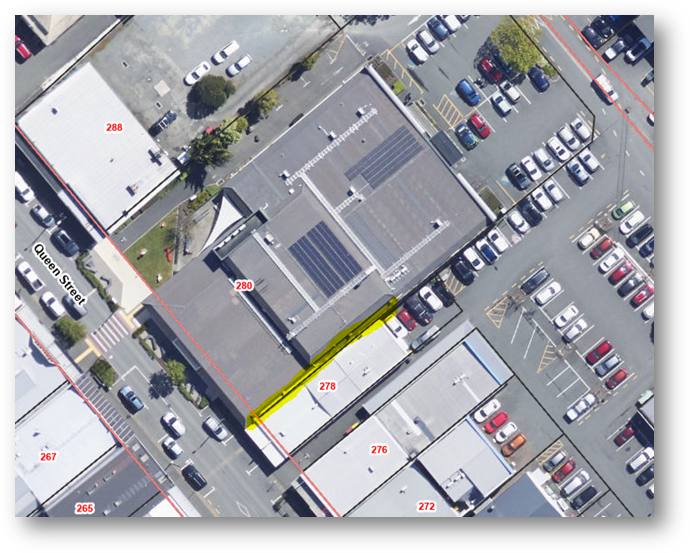 Aerial view of a parking lot

Description automatically generated