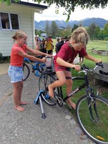 A child and child on a bike

AI-generated content may be incorrect.
