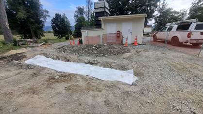 A building under construction with orange cones

AI-generated content may be incorrect.