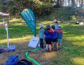A group of kids standing in a field

AI-generated content may be incorrect.