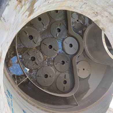 A circular object with holes in it

AI-generated content may be incorrect.