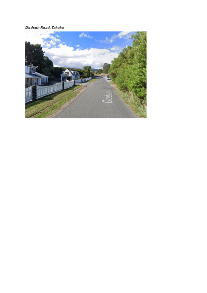 A road with trees and a fence

AI-generated content may be incorrect.