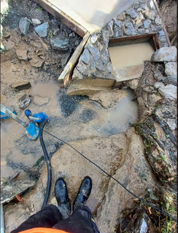 A person standing in the mud

AI-generated content may be incorrect.