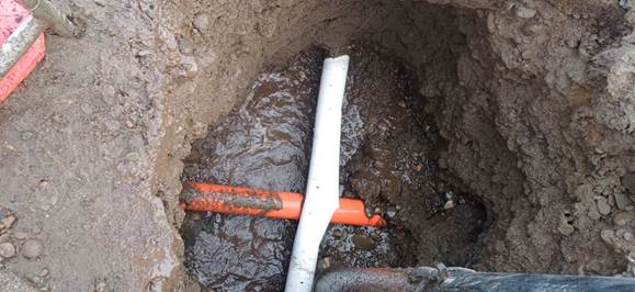 A pipe in the ground

AI-generated content may be incorrect.